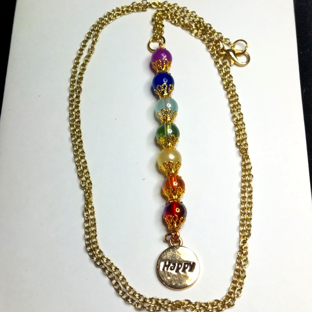 Gold chakra necklace